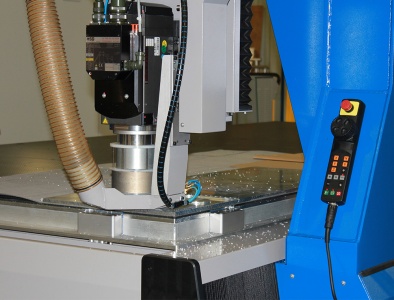 High-speed electrospindle for CNC milling and routing machines with suction plate